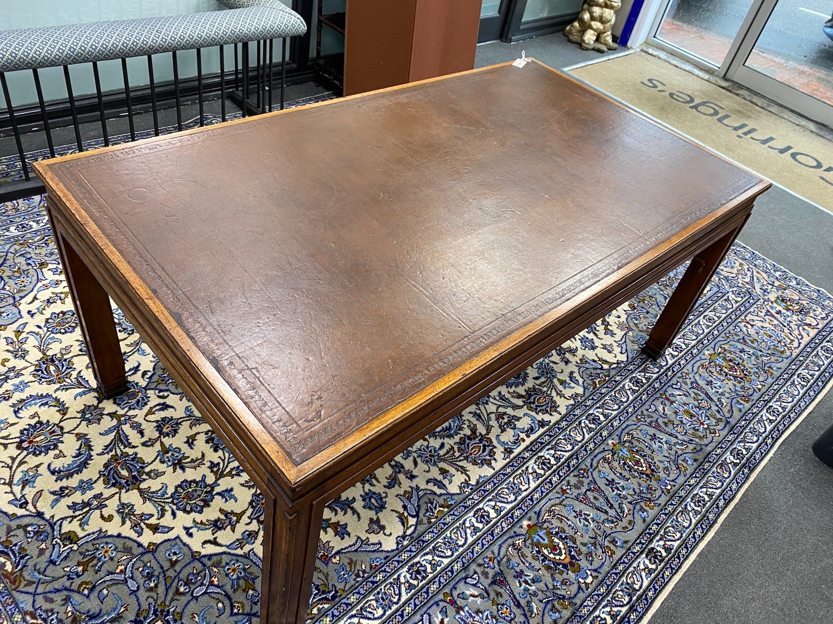 SOLD An Art Deco rectangular mahogany library table with leather inset top, bears Howard & Son retail plaque, length 175cm, width 99cm, height 77cm